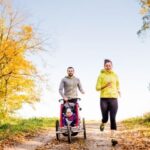family running with buggy